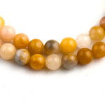 Load image into Gallery viewer, Essence of Life 108 Beads Mala zoomed on natural topaz stones beads seen from top
