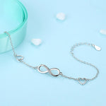 Load image into Gallery viewer, Opened Eternal True Love Elegance Bracelet in decorated environment seen from front
