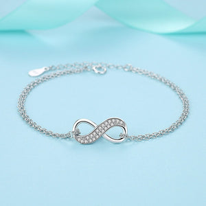 Serenity of Eternal Unity Elegance Bracelet in decorated environment positioned in O shape seen from front