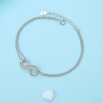 Load image into Gallery viewer, Serenity of Eternal Unity Elegance Bracelet in decorated environment positioned in O shape flat seen from top
