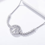 Load image into Gallery viewer, Supreme Serenity of Life&#39;s Tree Elegance Bracelet Focused on Tree of Life Symbol and River Stones in decorated environement seen from top
